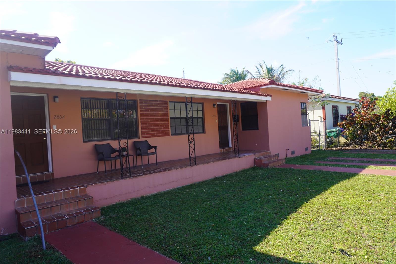 2660 Southwest 36th Avenue Miami, FL 33133 - Photo 5 of 32 a view of a house with patio