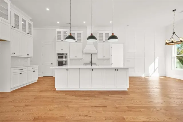 a view of an empty room with a fireplace