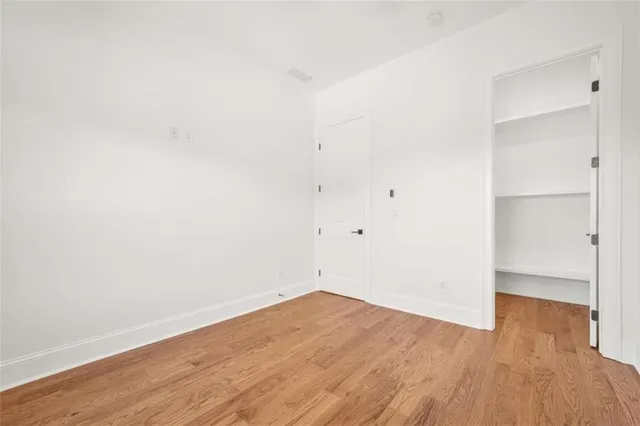 a view of a park with a tree