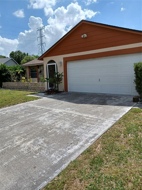 7810 Jenner Avenue New Port Richey, FL 34655 - Photo 1 of 1 Front of home with 2 car garage