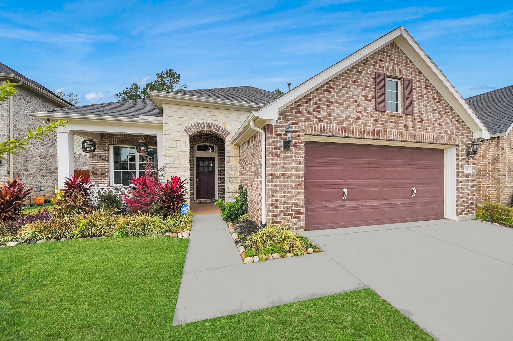 211 Pleasant Hill Way Conroe, TX 77304 - Photo 3 of 50 a front view of a house with a yard