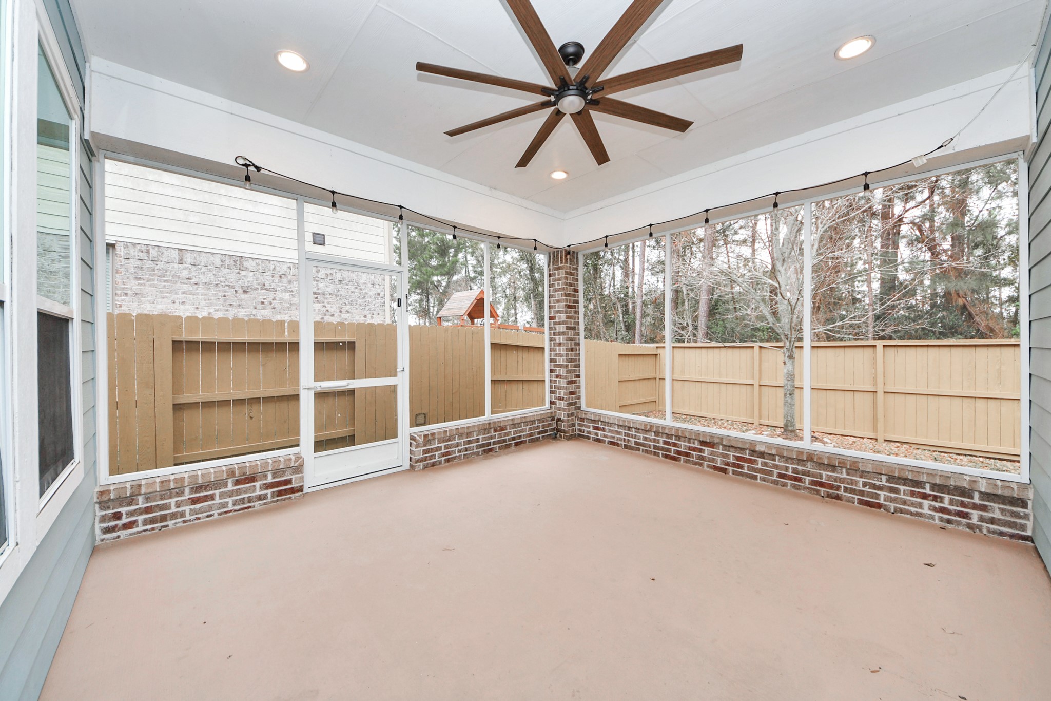 211 Pleasant Hill Way Conroe, TX 77304 - Photo 43 of 50 a view of an empty room with a window
