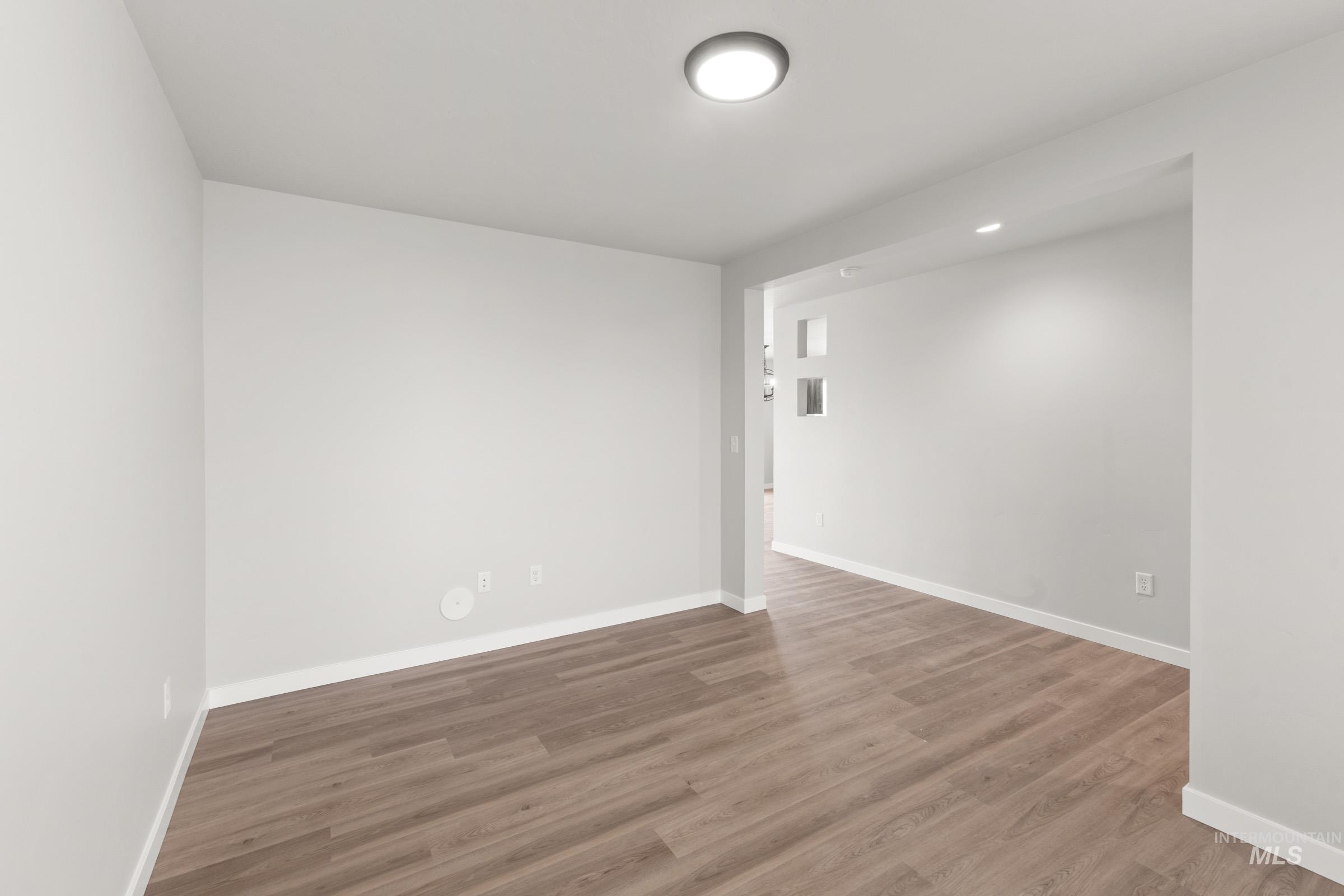 461 Waverly Avenue Middleton, ID 83644 - Photo 11 of 22 Spare room with wood finished floors and baseboards
