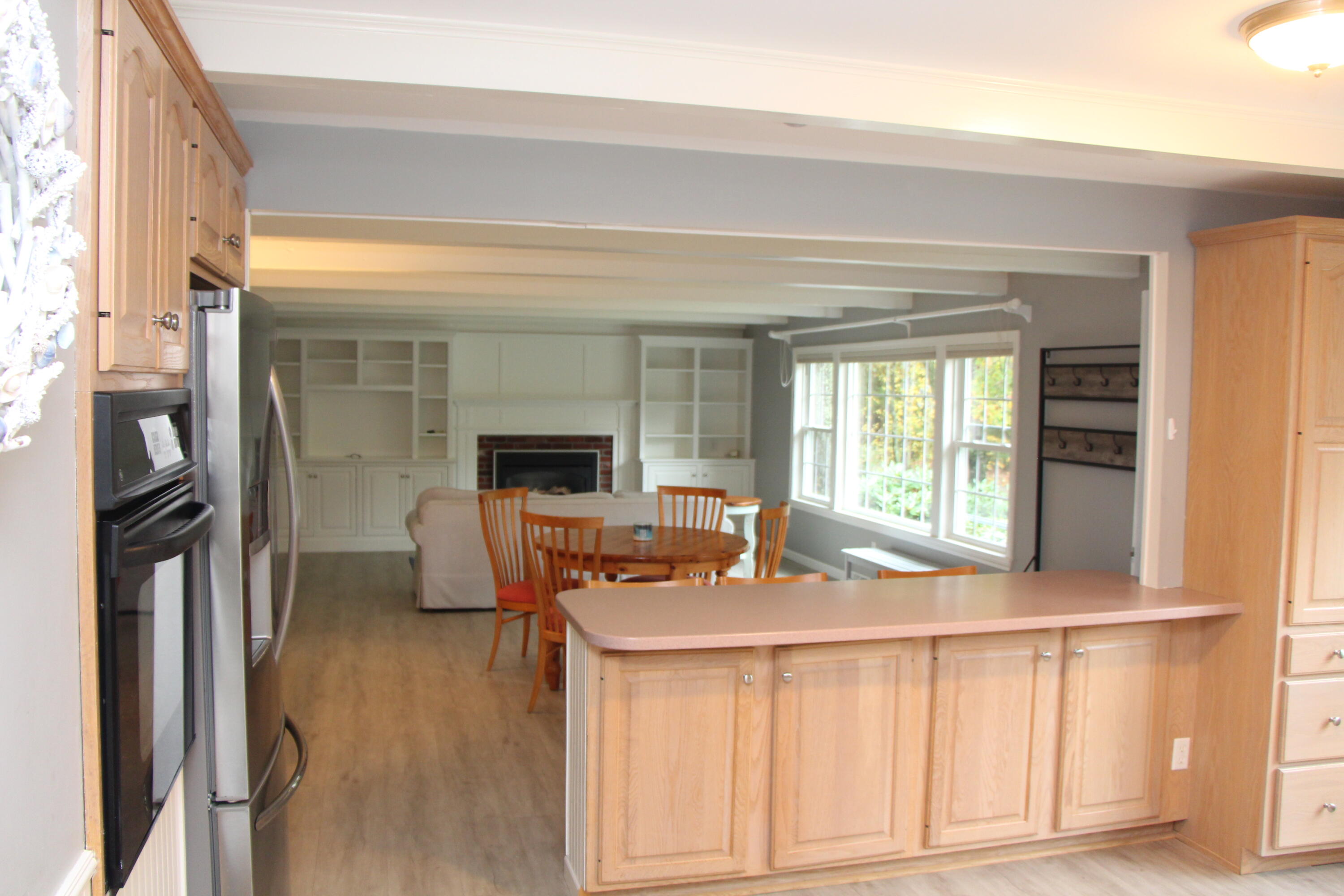 26 Murval Road Pocasset, MA 02559 - Photo 9 of 29 a living room with fireplace furniture and a window