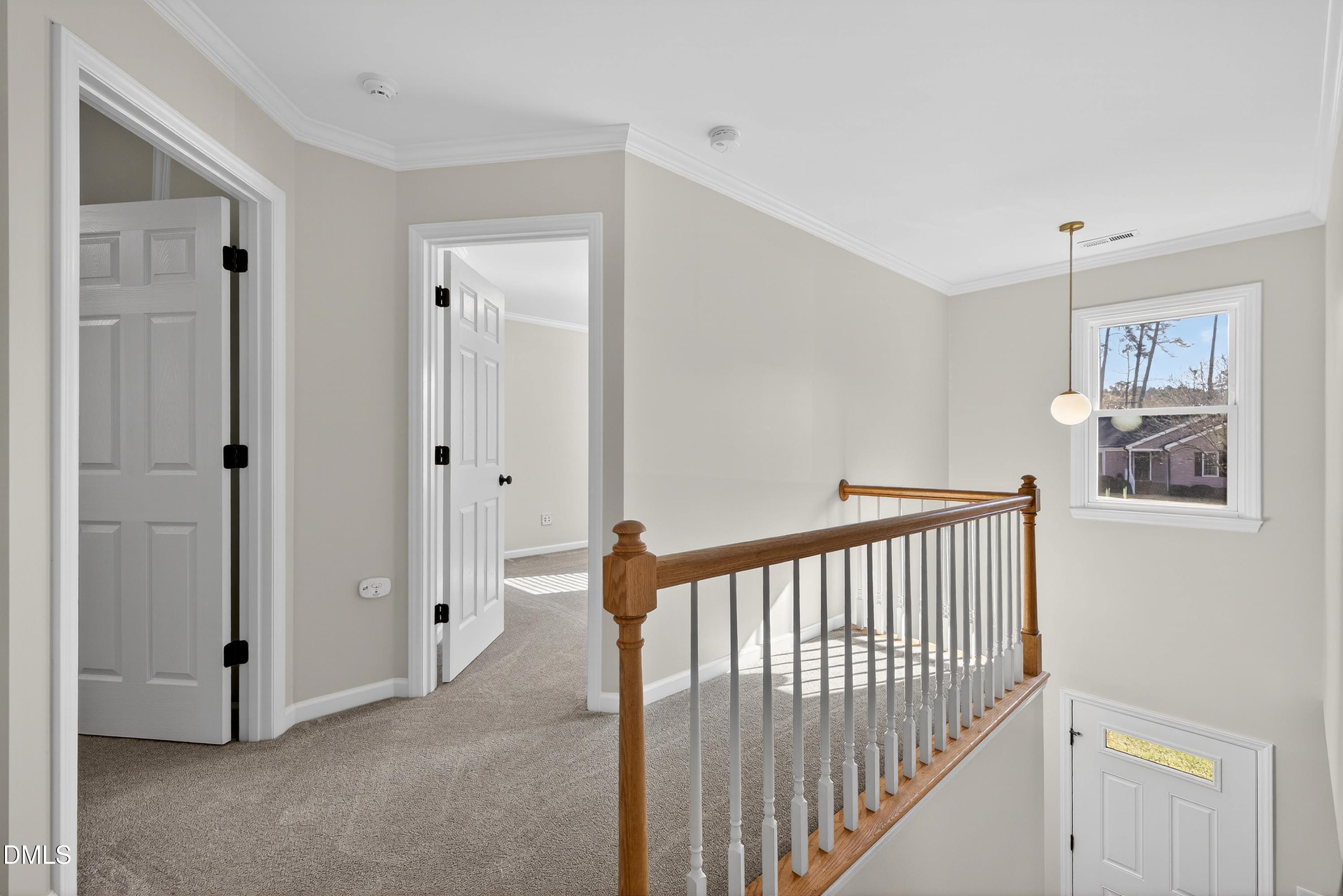 6009 Sweden Drive Raleigh, NC 27612 - Photo 15 of 38 a view of a hallway with interior of the house