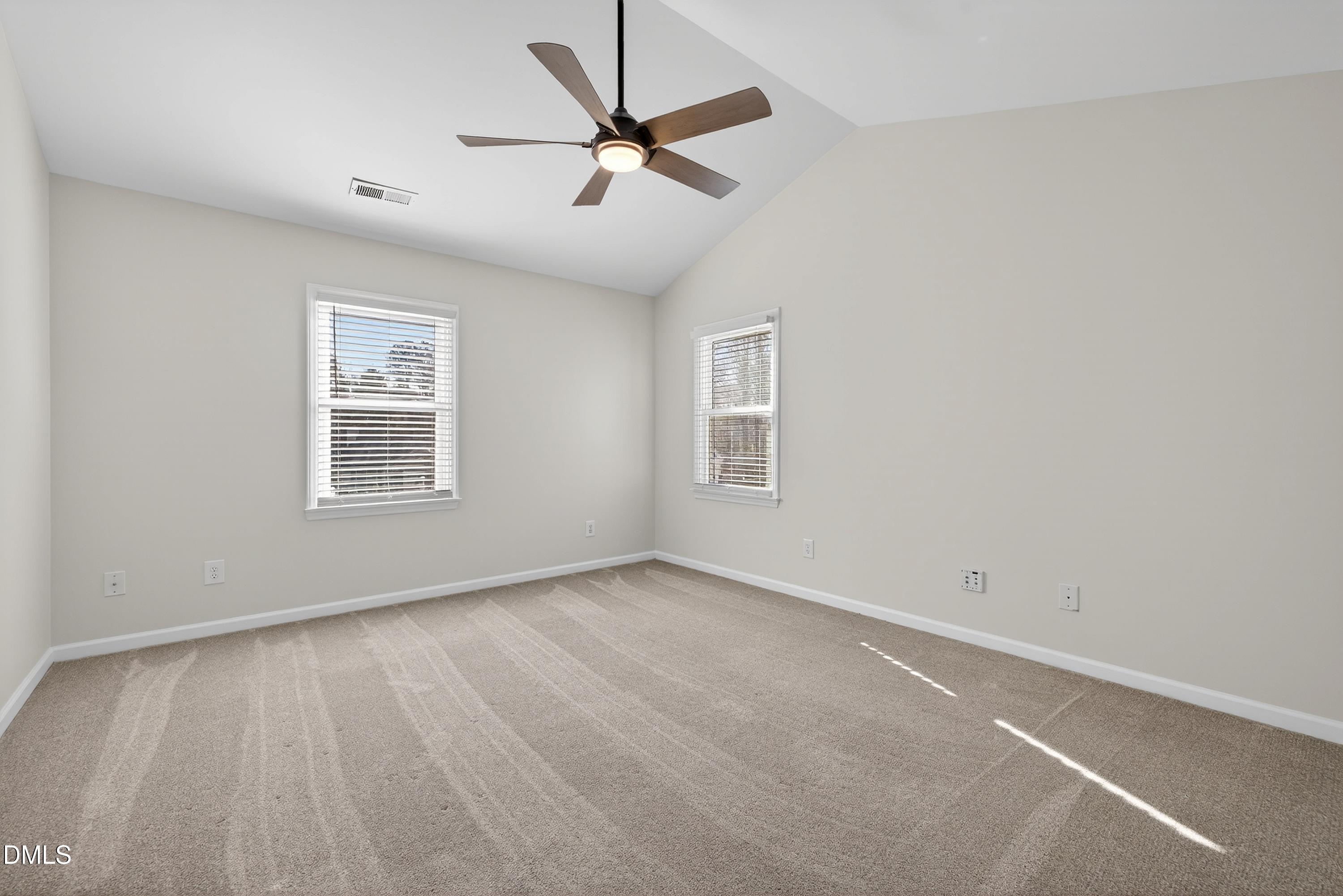 6009 Sweden Drive Raleigh, NC 27612 - Photo 18 of 38 wooden floor in an empty room with a window