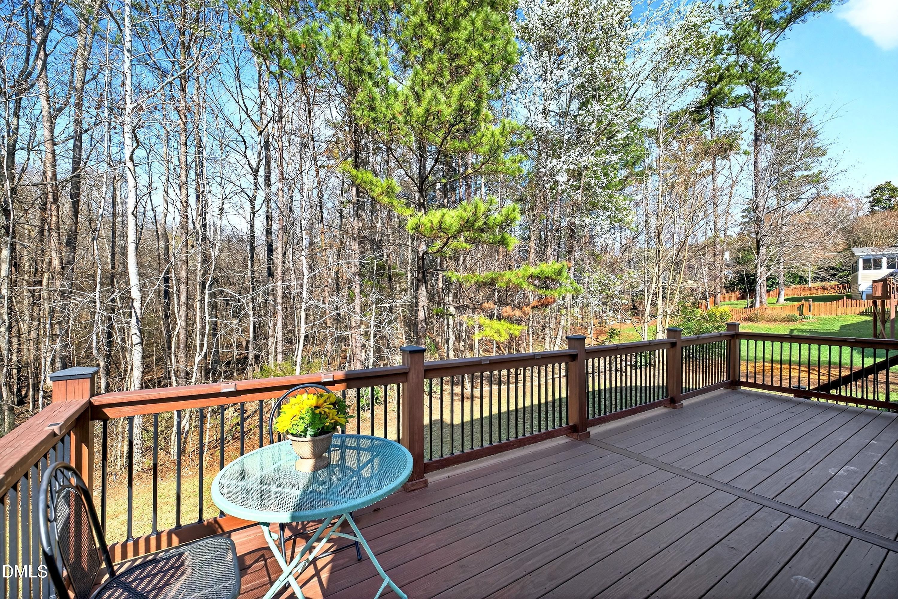 6009 Sweden Drive Raleigh, NC 27612 - Photo 30 of 38 a view of a chairs on wooden deck