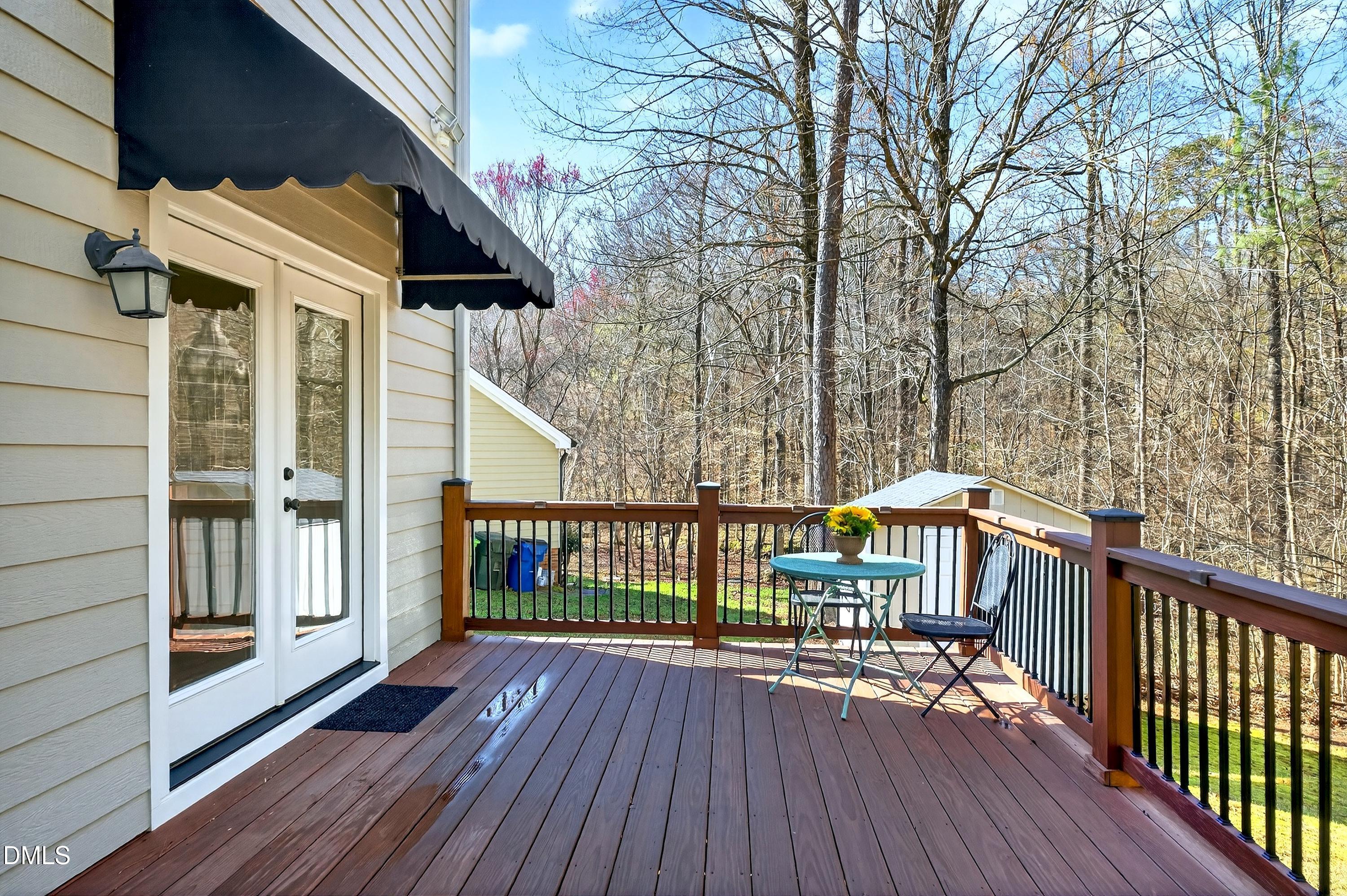 6009 Sweden Drive Raleigh, NC 27612 - Photo 32 of 38 a view of a wooden deck with large trees