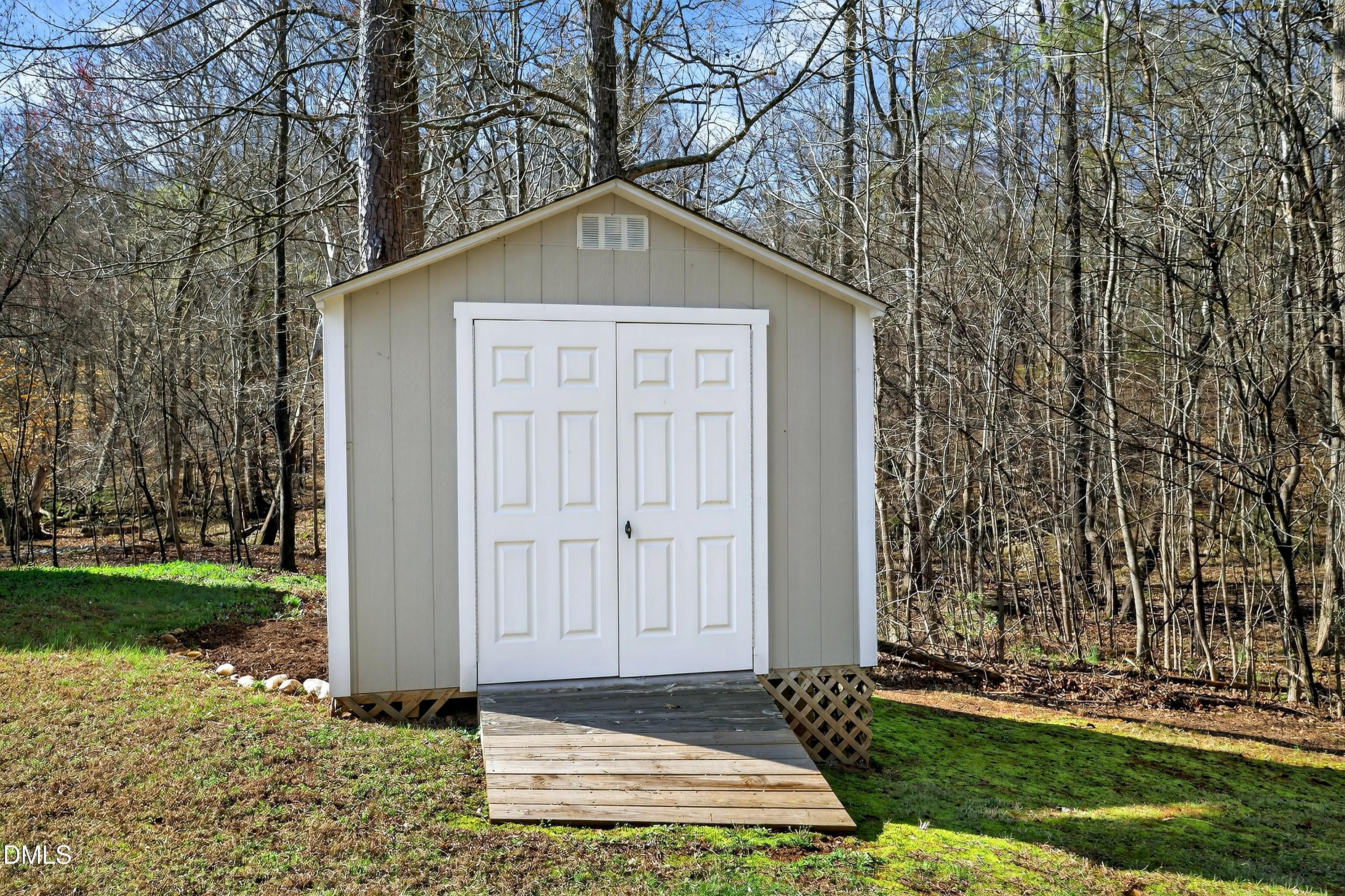 6009 Sweden Drive Raleigh, NC 27612 - Photo 35 of 38 a front view of a house with a yard
