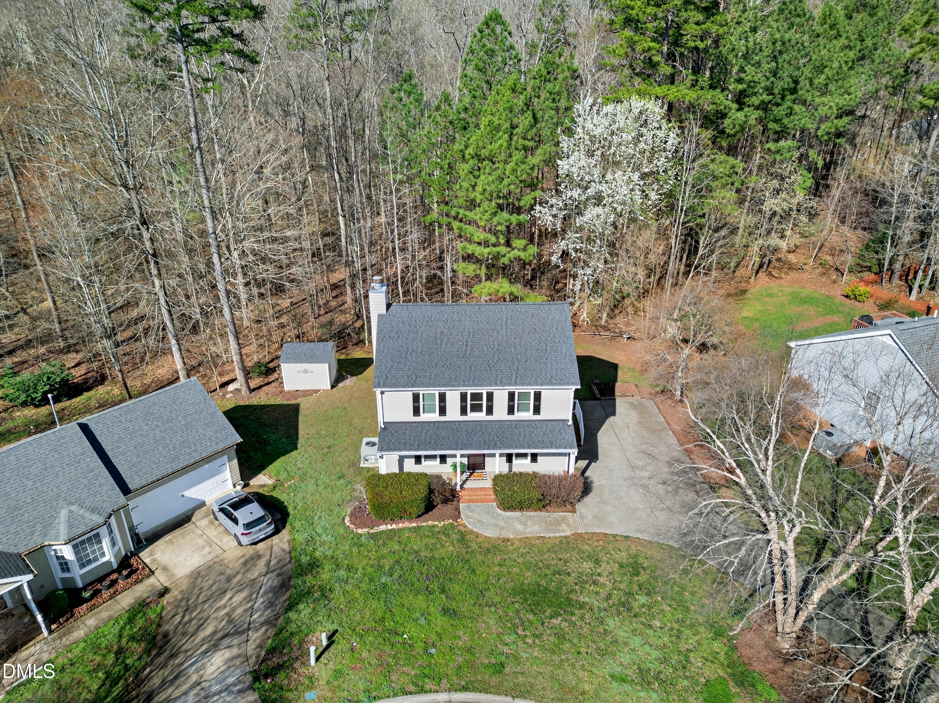 6009 Sweden Drive Raleigh, NC 27612 - Photo 36 of 38 a sign that is sitting on a brick wall