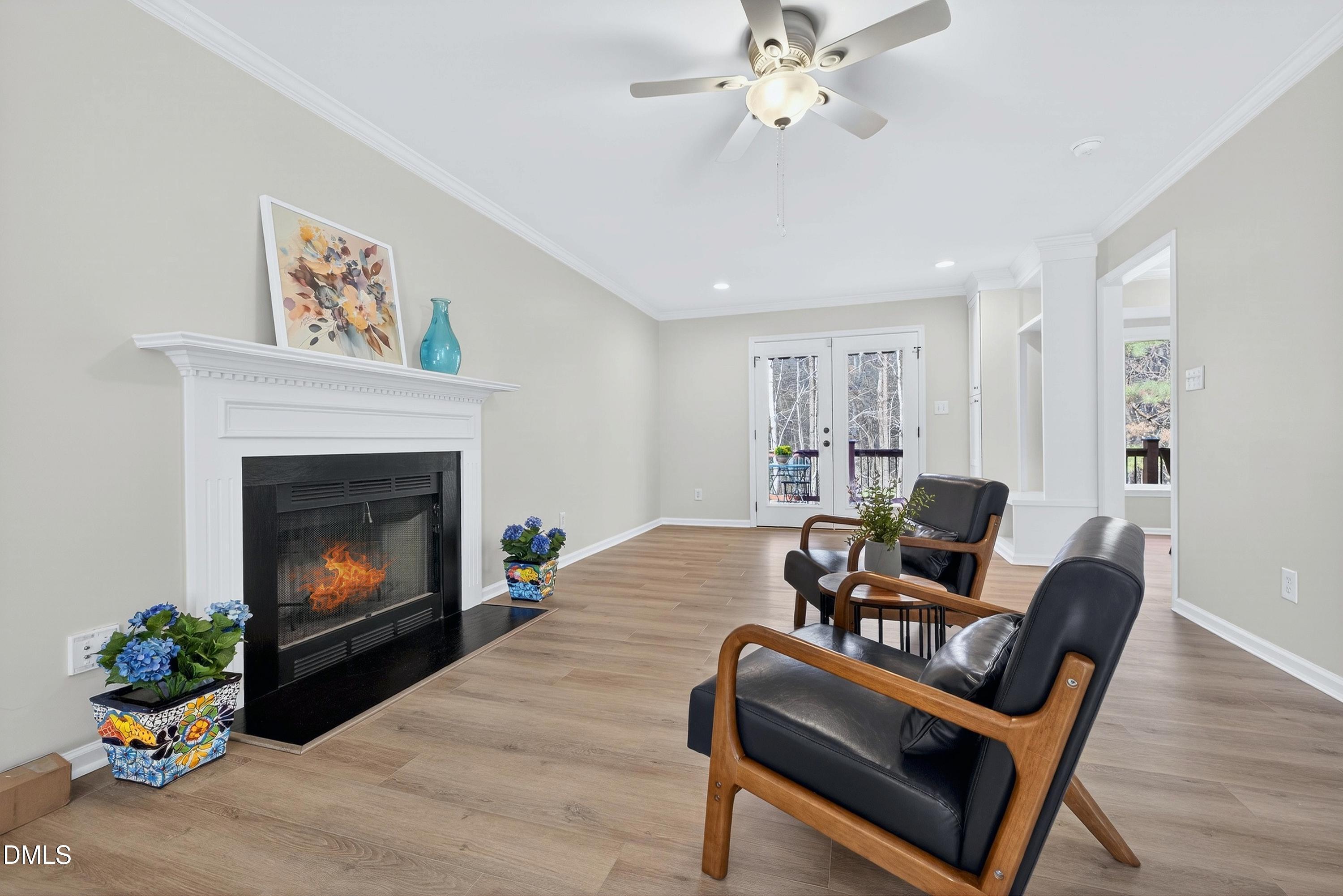 6009 Sweden Drive Raleigh, NC 27612 - Photo 5 of 38 a living room with furniture and a fireplace