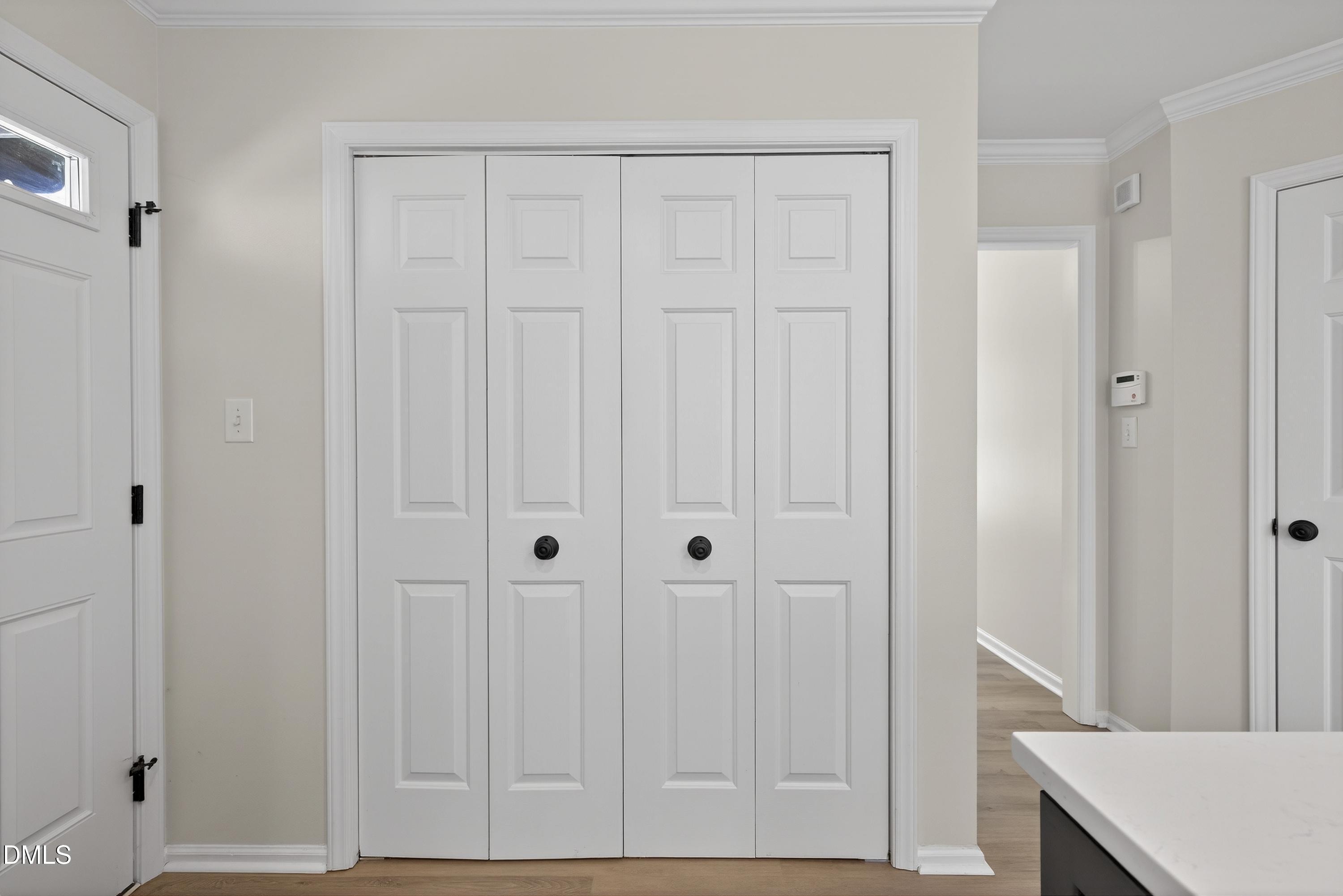6009 Sweden Drive Raleigh, NC 27612 - Photo 10 of 38 a view of a hallway with closet
