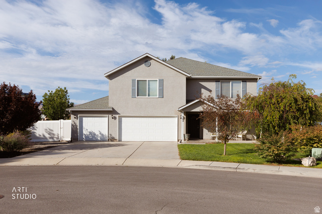 342 South Willow Patch Road Lehi, UT 84043 - Photo 1 of 30 Two-story stucco exterior with a multi-car garage, mature landscaping, and a fenced side yard