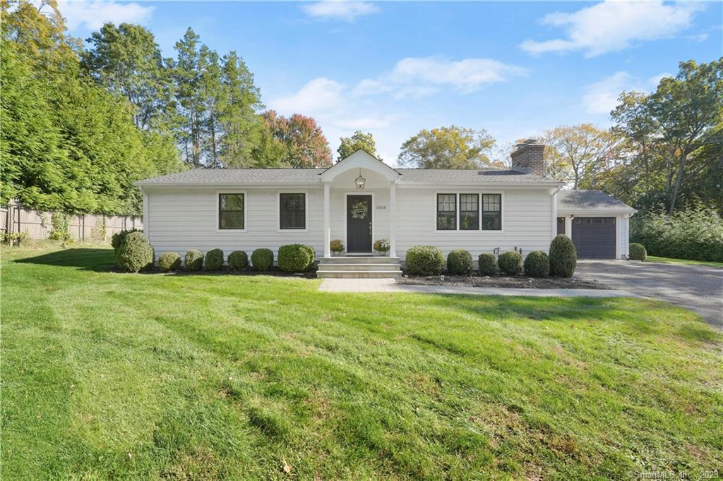 2010 Stratfield Road Fairfield, CT 06825 - Photo 1 of 1 a view of a house with a backyard