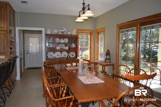 8919 Red Fish Pt Road Lillian, AL 36549 - Photo 18 of 46 Large dining area.