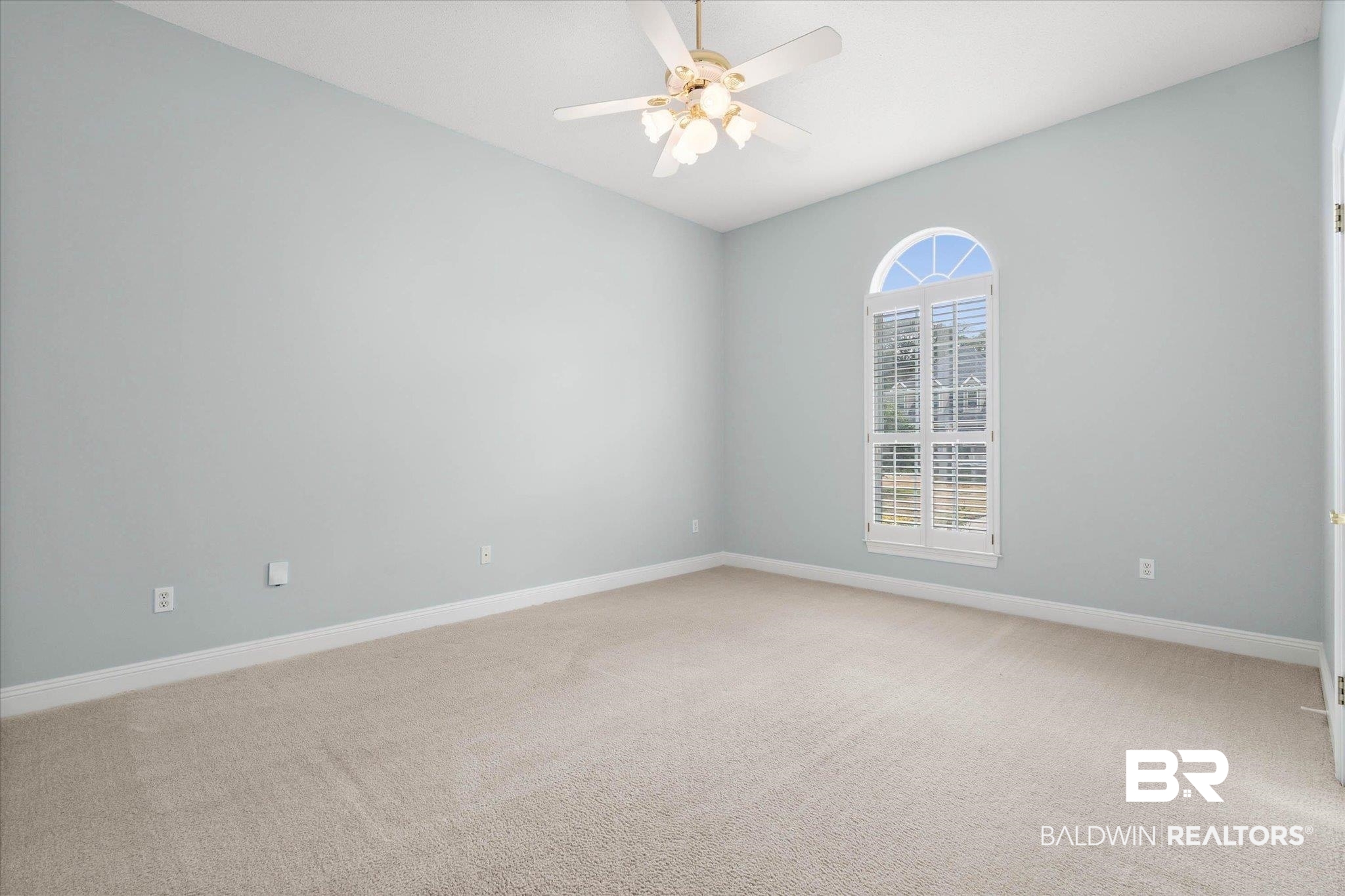 1083 Southern Way Court Mobile, AL 36609 - Photo 21 of 31 Empty room featuring light carpet and a ceiling fan
