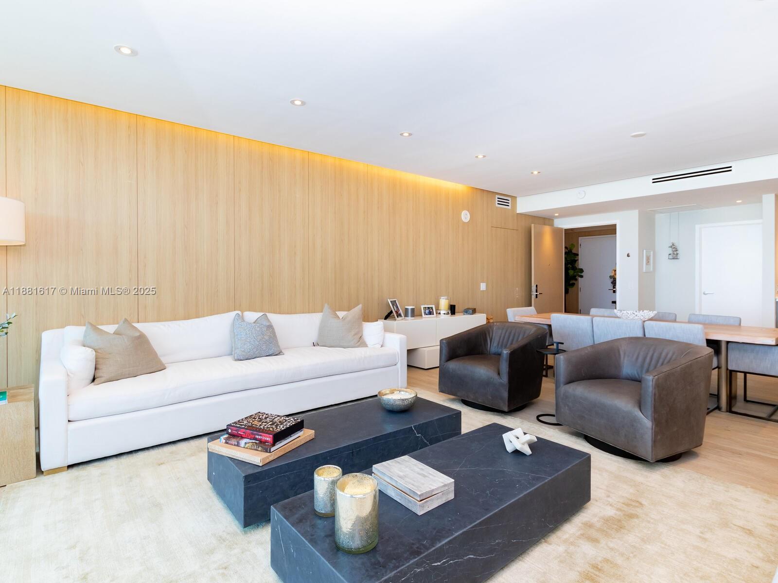 360 Ocean Drive, Unit 304S Key Biscayne, FL 33149 - Photo 12 of 40 a living room with furniture