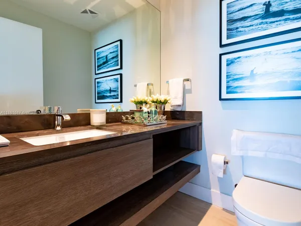 a bathroom with a sink and a toilet