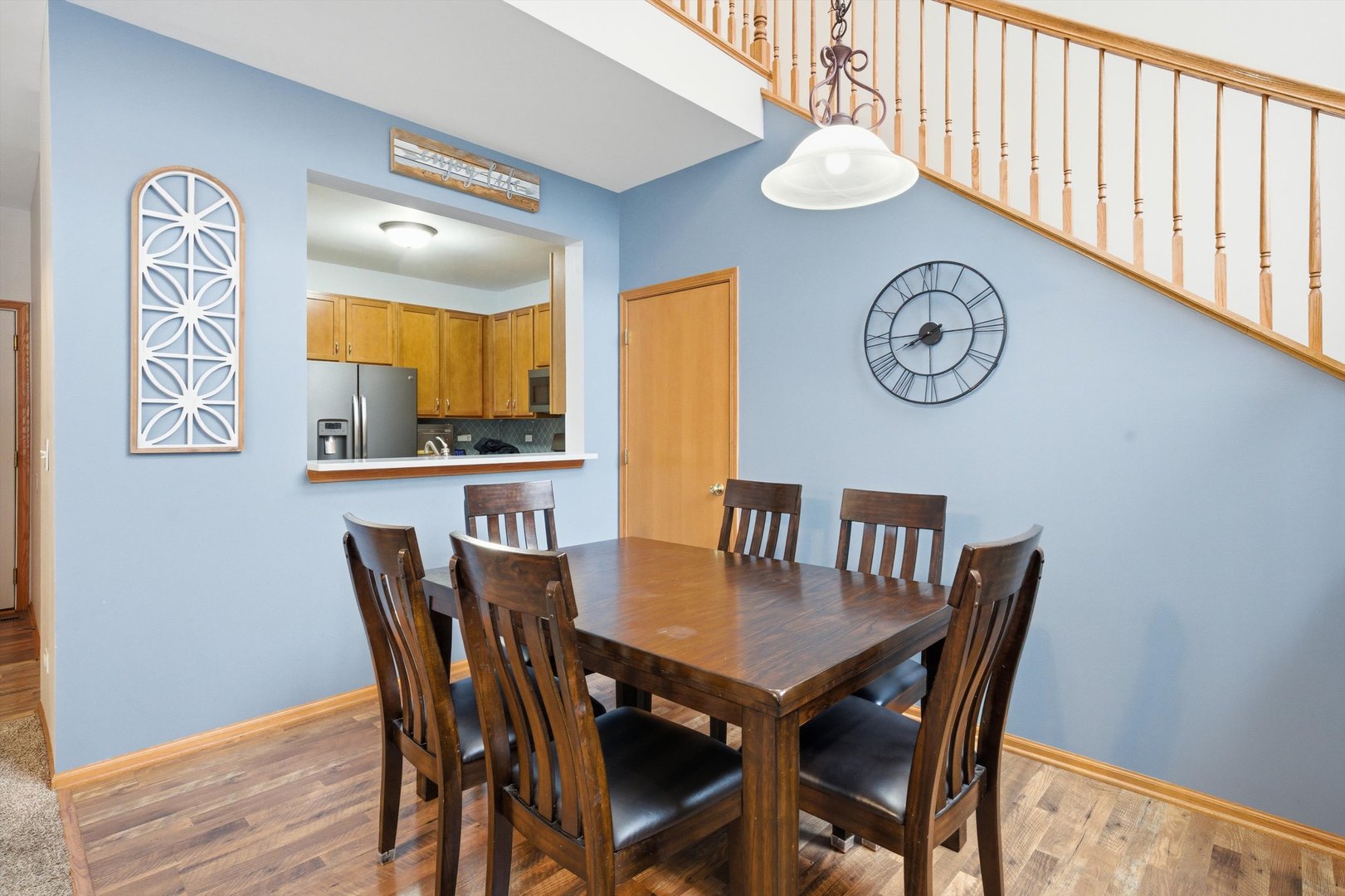 1110 Colonial Drive Joliet, IL 60432 - Photo 17 of 34 a view of a dining room with a table and chairs