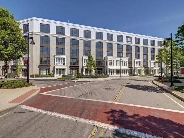a view of a building with a swimming pool