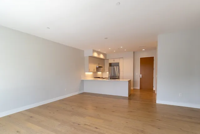a view of a kitchen and a window