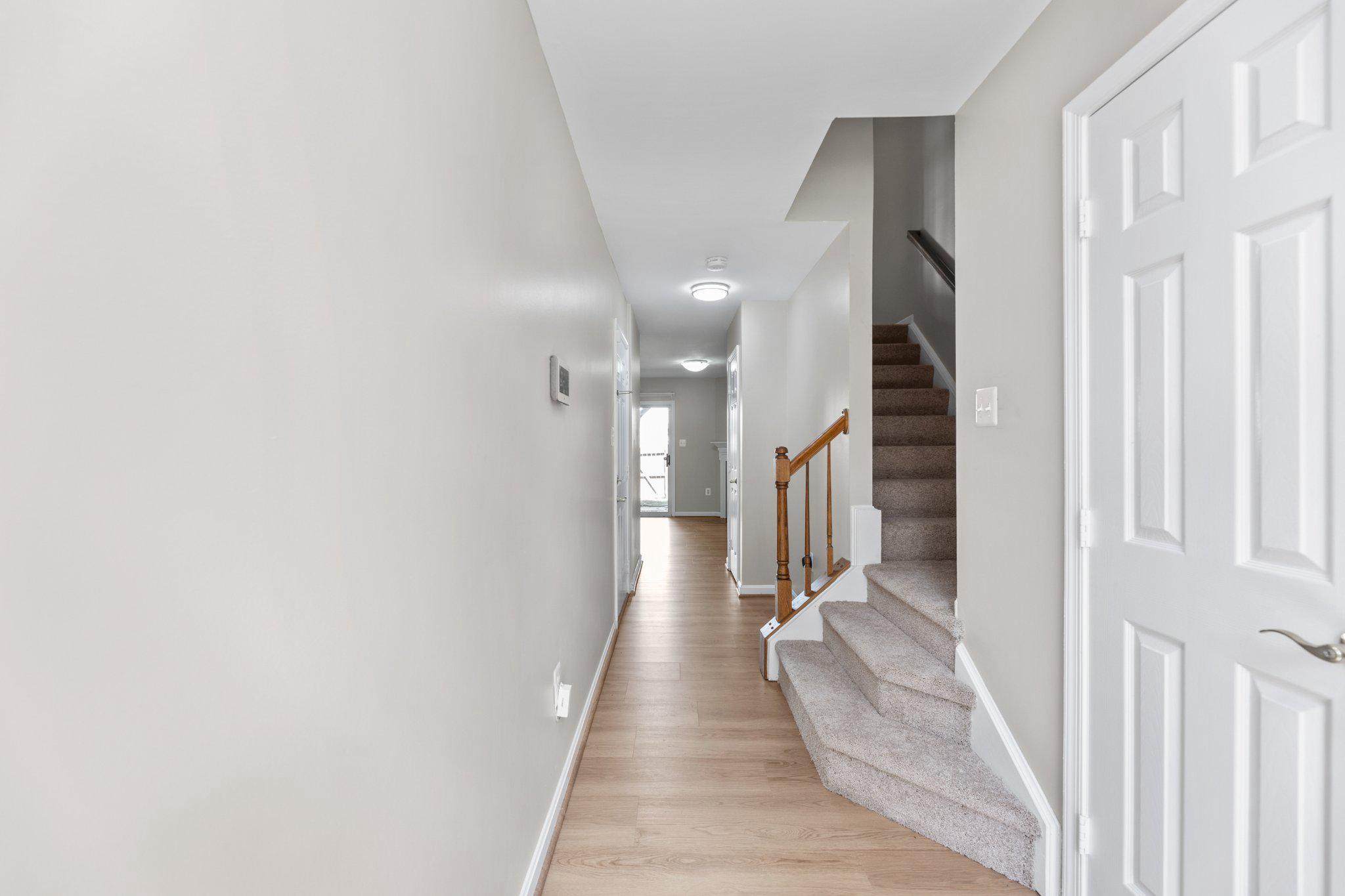 9241 Lorton Valley Road Lorton, VA 22079 - Photo 6 of 45 Inviting hallway with new ceiling lights.