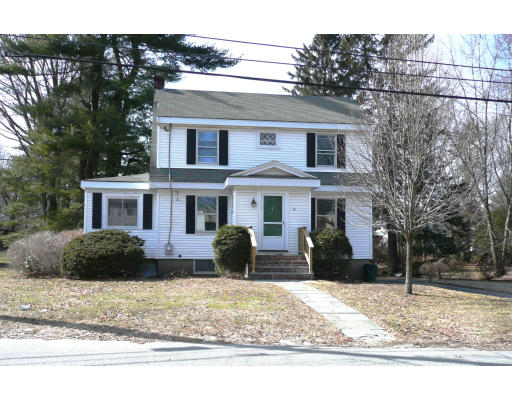 14 Harding Road Lexington, MA 02420 - Photo 7 of 9 a front view of a house with a yard