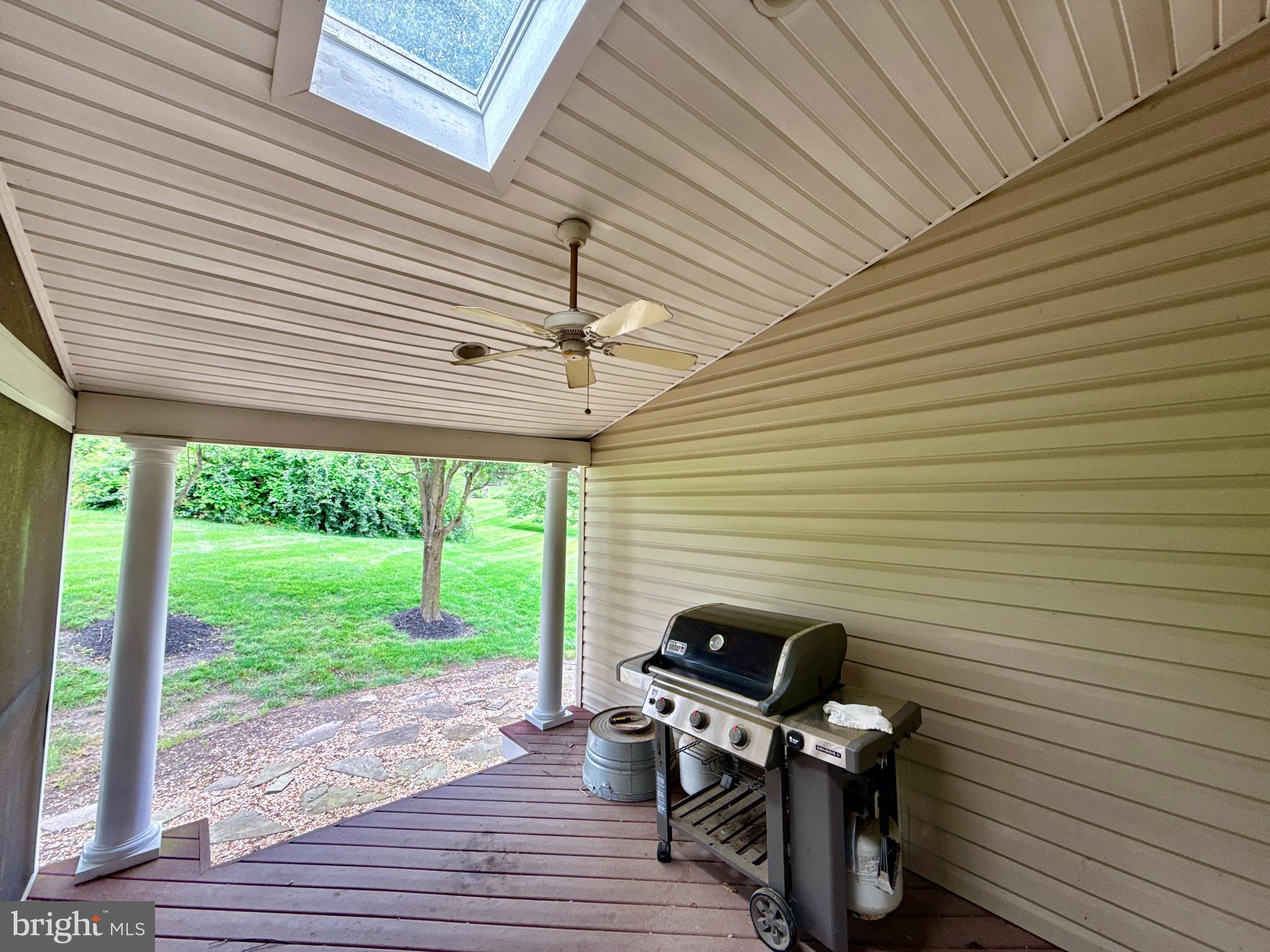 14100 Twisting Lane Dayton, MD 21036 - Photo 26 of 63 a view of a deck with wooden floor and a barbeque grill