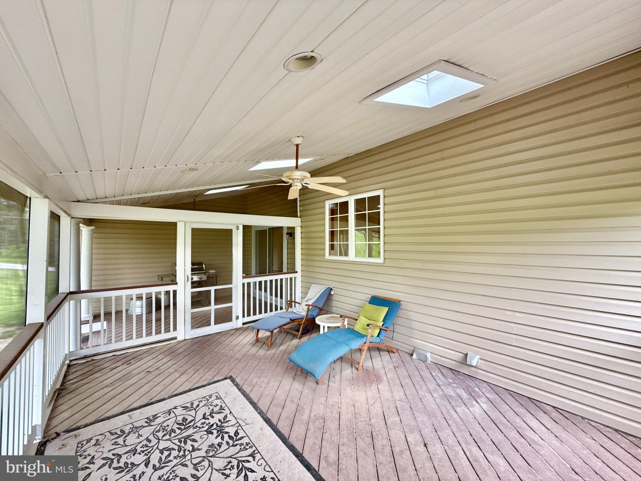 14100 Twisting Lane Dayton, MD 21036 - Photo 27 of 63 a view of a house with a patio and a yard
