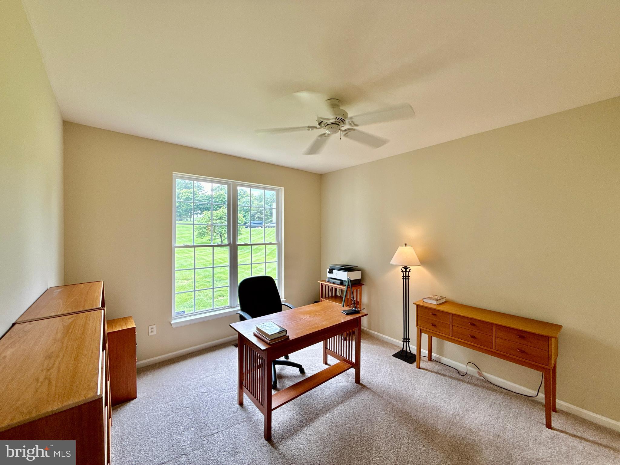 14100 Twisting Lane Dayton, MD 21036 - Photo 30 of 63 a living room with furniture and a window