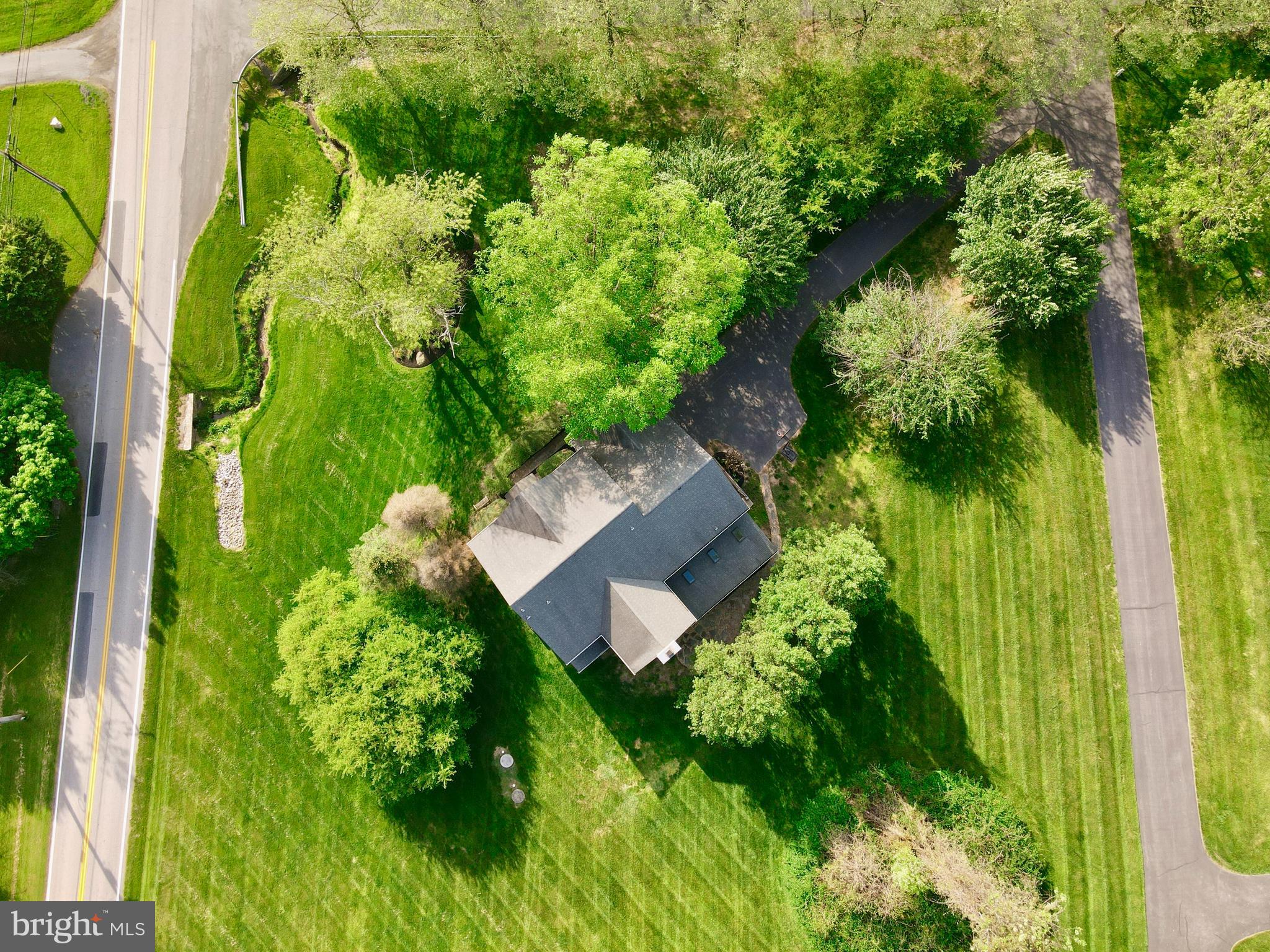 14100 Twisting Lane Dayton, MD 21036 - Photo 3 of 63 an aerial view of a house with a yard
