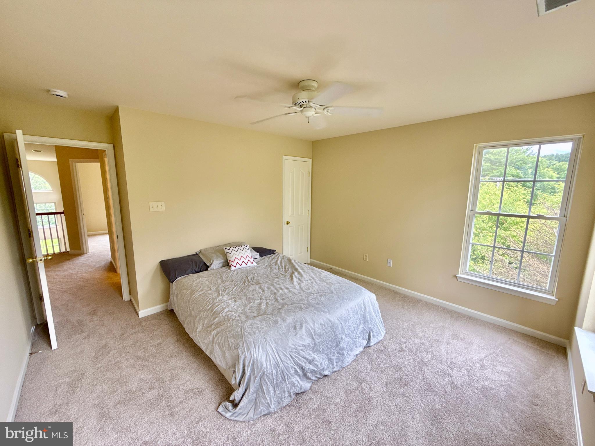 14100 Twisting Lane Dayton, MD 21036 - Photo 51 of 63 a bedroom with a bed and a window