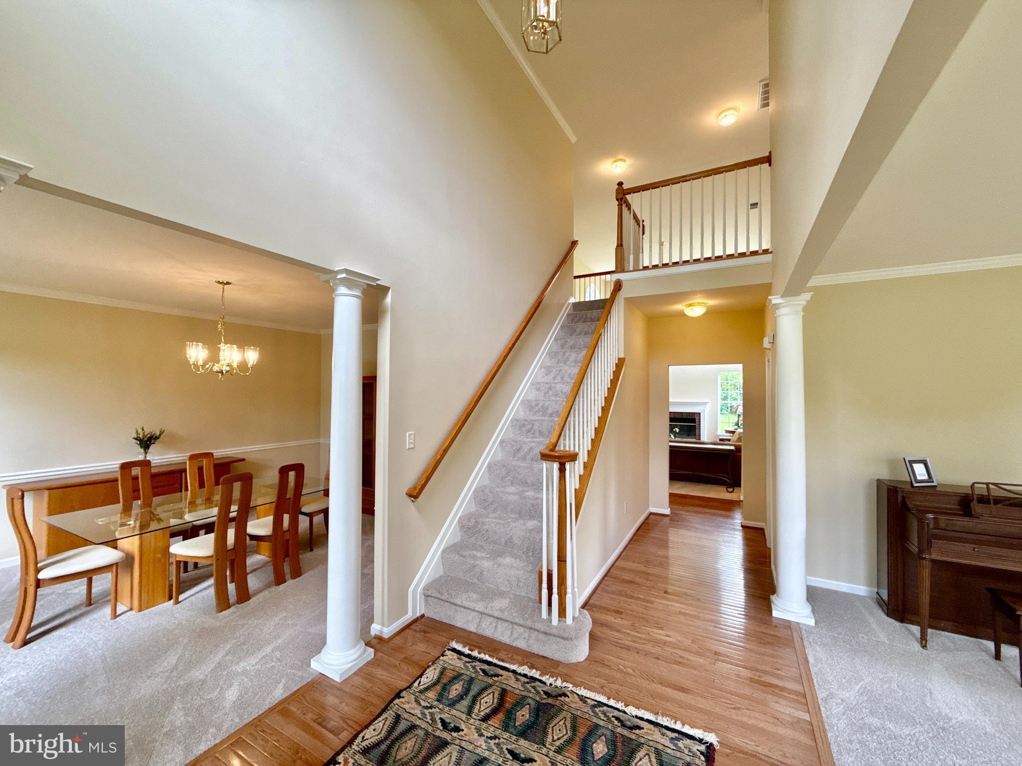 14100 Twisting Lane Dayton, MD 21036 - Photo 7 of 63 a view of entryway and hall with wooden floor
