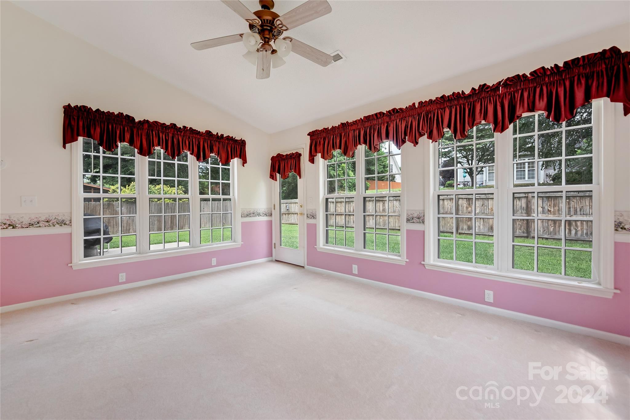 115 English Oak Road Fletcher, NC 28732 - Photo 12 of 30 a view of a room with wooden walls and windows