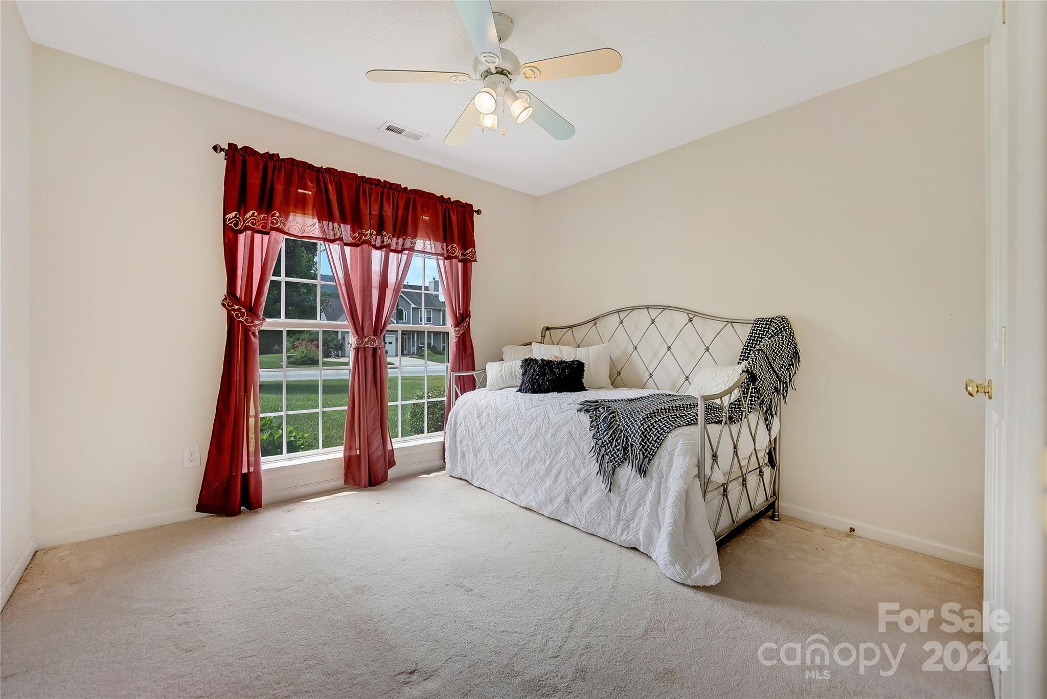 115 English Oak Road Fletcher, NC 28732 - Photo 19 of 30 a bedroom with a bed and a window