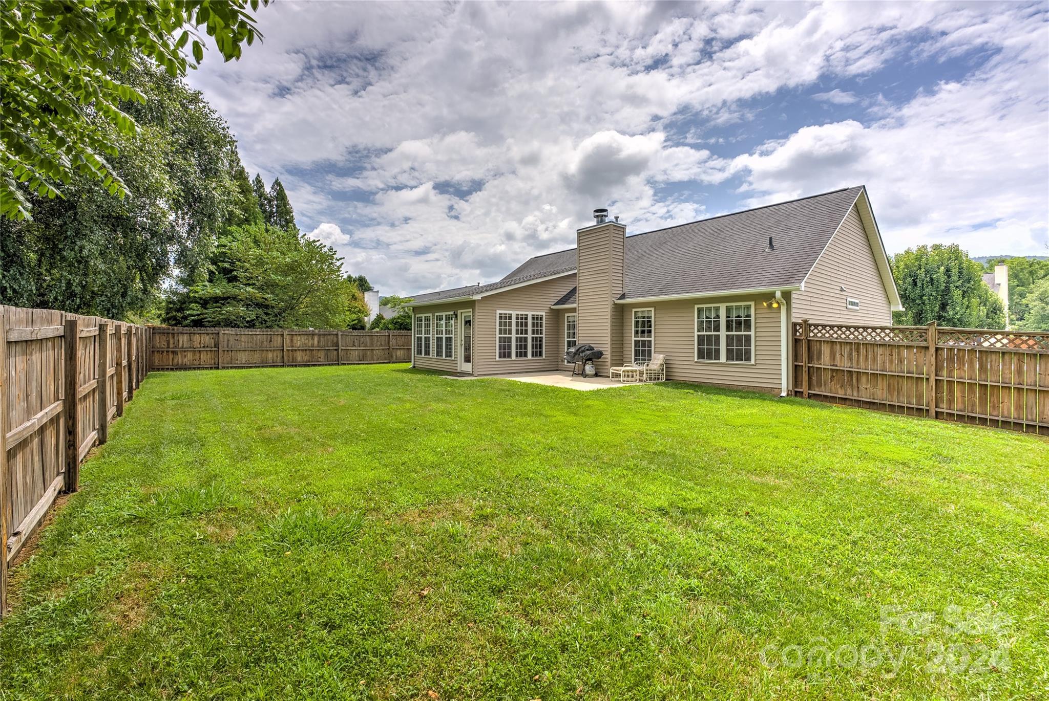 115 English Oak Road Fletcher, NC 28732 - Photo 24 of 30 a view of a house with backyard and porch