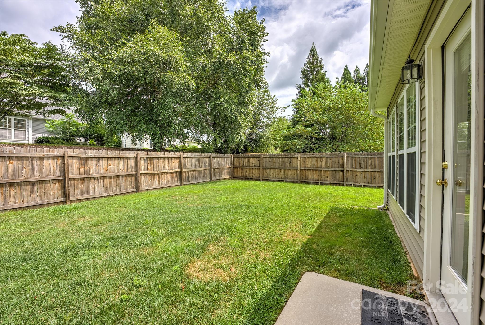 115 English Oak Road Fletcher, NC 28732 - Photo 26 of 30 a view of yard with grass and trees