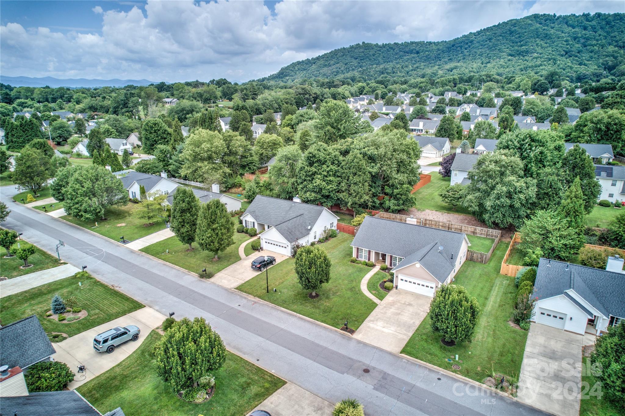 115 English Oak Road Fletcher, NC 28732 - Photo 29 of 30 an aerial view of a house with a yard