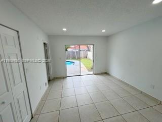 26508 Southwest 128th Court Homestead, FL 33032 - Photo 13 of 19 a view of a livingroom and a kitchen