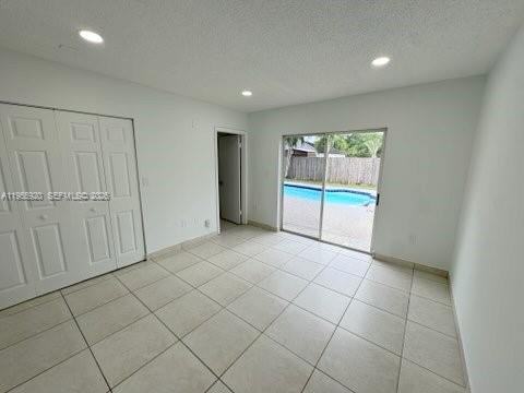 26508 Southwest 128th Court Homestead, FL 33032 - Photo 14 of 19 a view of an empty room and window