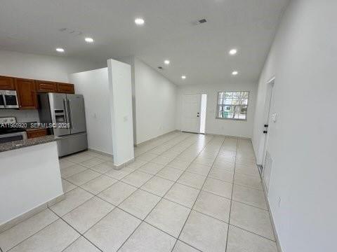 26508 Southwest 128th Court Homestead, FL 33032 - Photo 7 of 19 a view of a kitchen with refrigerator and windows