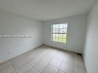 26508 Southwest 128th Court Homestead, FL 33032 - Photo 10 of 19 a view of an empty room with a window