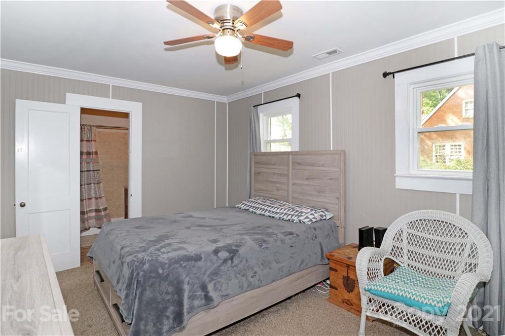 105 Stony Point School Road Stony Point, NC 28678 - Photo 13 of 25 a bedroom with a bed and a window