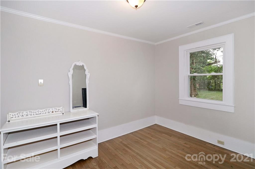105 Stony Point School Road Stony Point, NC 28678 - Photo 18 of 25 a view of room with window and hardwood floor