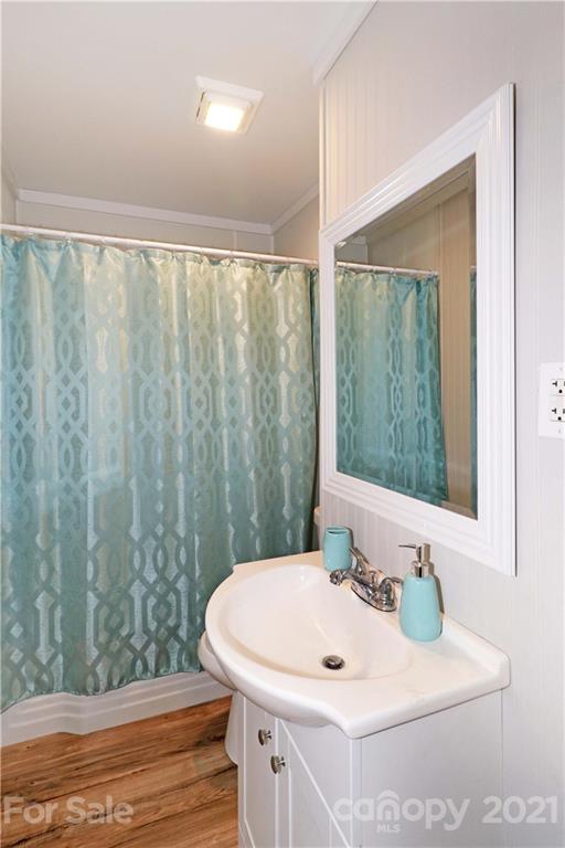 105 Stony Point School Road Stony Point, NC 28678 - Photo 20 of 25 a bathroom with a sink and a mirror