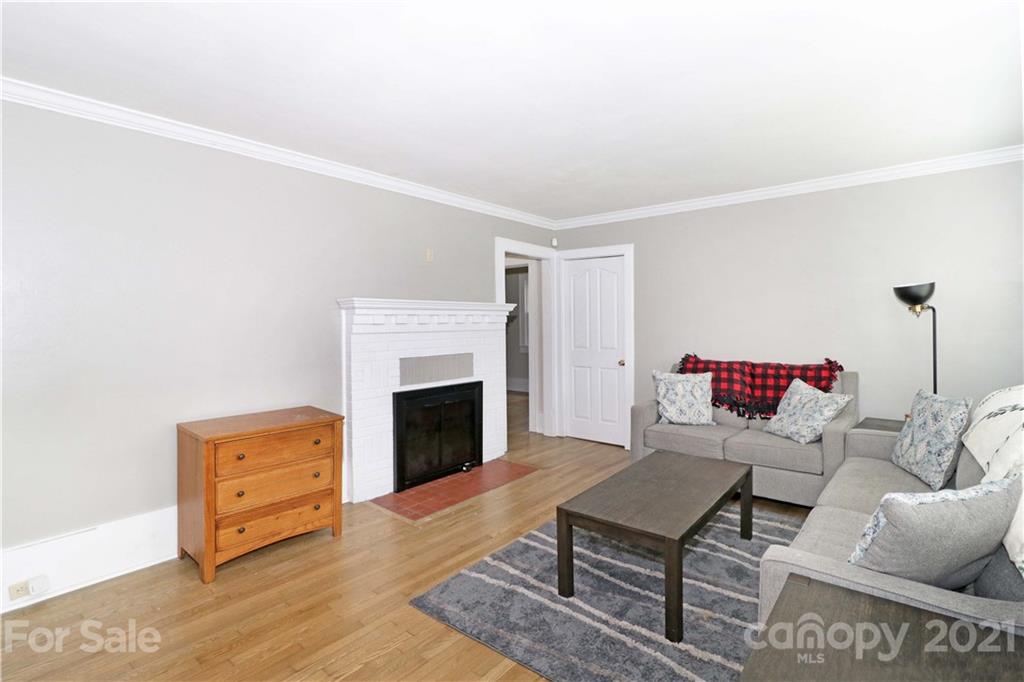 105 Stony Point School Road Stony Point, NC 28678 - Photo 5 of 25 a living room with furniture and a fireplace