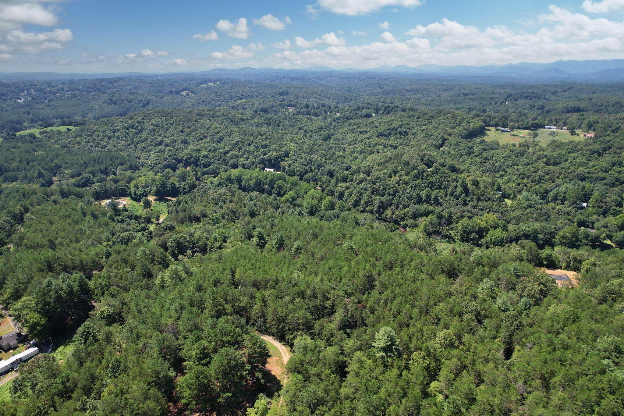 0 Staffordtown Road Copperhill, TN 37317 - Photo 9 of 12 an aerial view of residential house with outdoor space and trees around