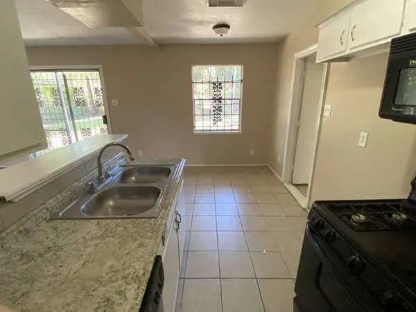 $1,699 | 10818 Carlton Drive, Houston, TX 77047