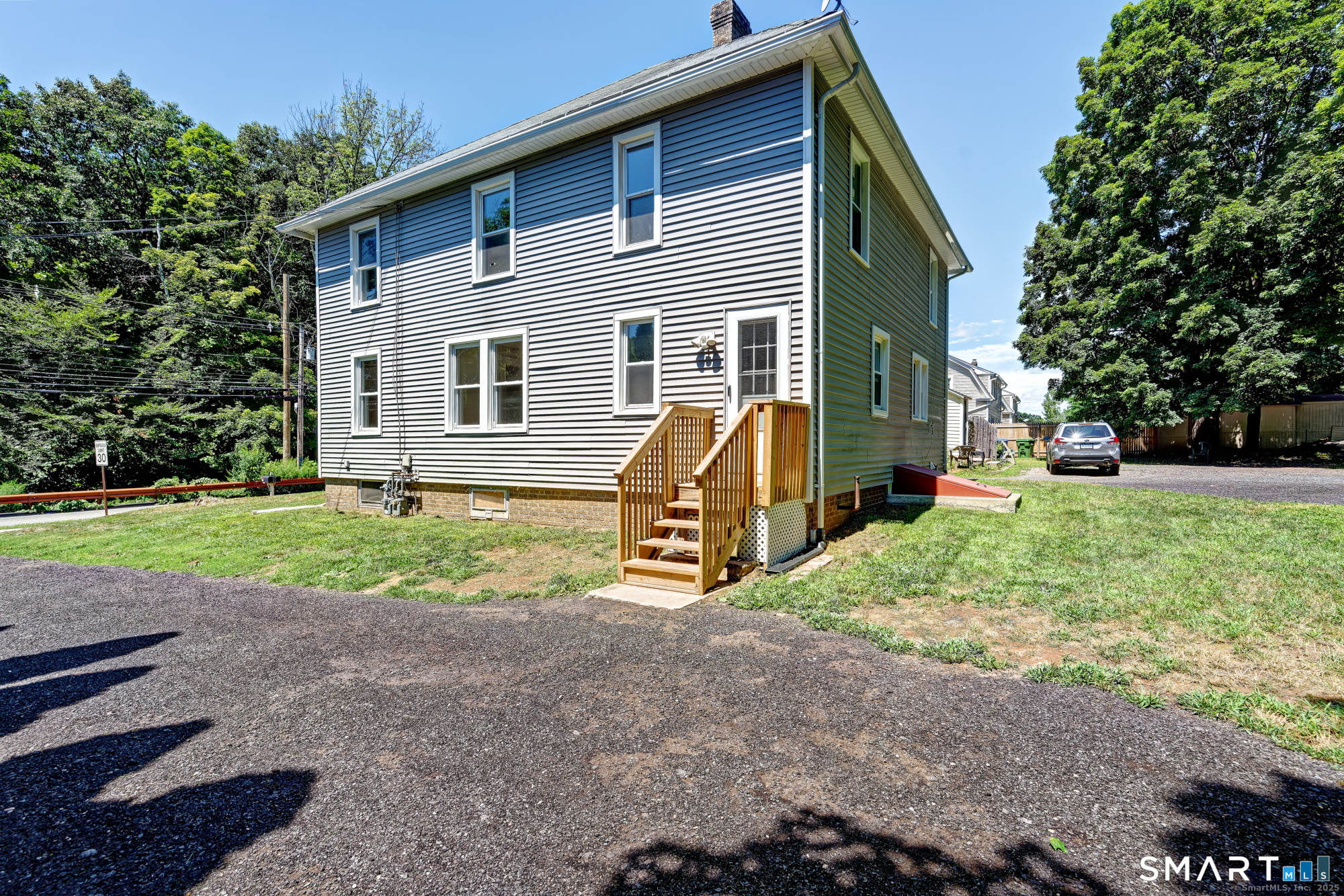 12 Addison Road Glastonbury, CT 06033 - Photo 11 of 12 CONVENIENT SIDE DOOR ENTRANCE FROM DRIVEWAY