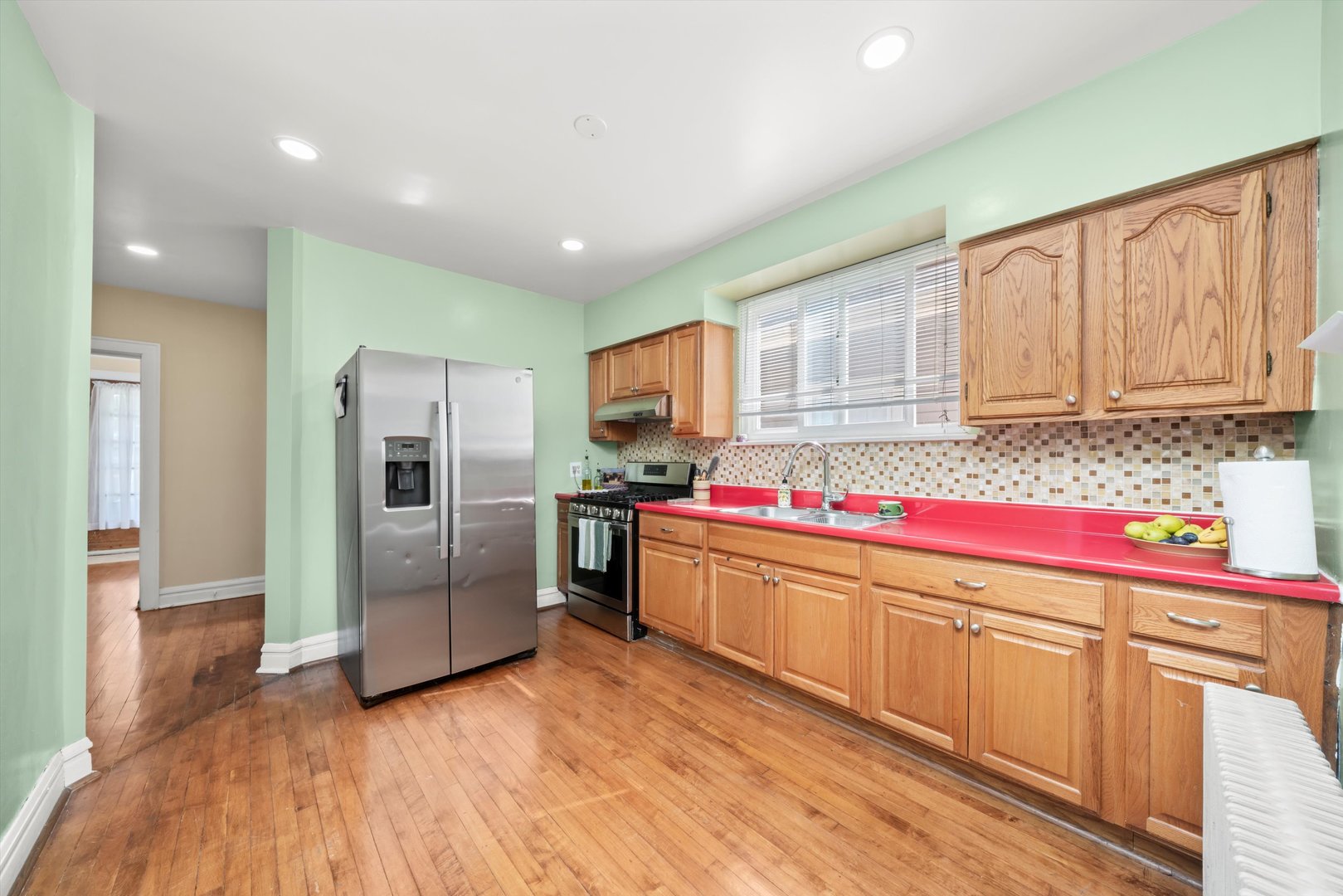 4218 Home Avenue Stickney, IL 60402 - Photo 11 of 35 a kitchen with cabinets and stainless steel appliances